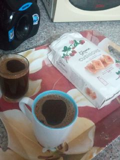 صورة لوصفة قهوه وسط وساده