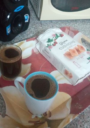 صورة لوصفة قهوه وسط وساده