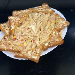 White sauce pasta with garlic butter and cheese bread A picture of White sauce pasta with garlic butter and cheese bread.