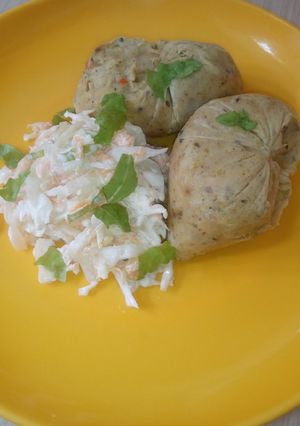 A picture of Potatoes moi-moi and coleslow.