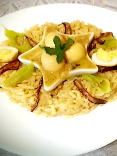 A picture of Eggs korma and rice pilau.