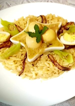 A picture of Eggs korma and rice pilau.