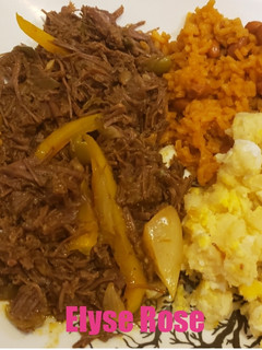 A picture of Chef Zee's Ropa Vieja (shredded beef).