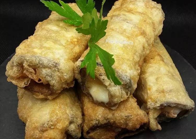 Rollitos de berenjena relleno de jamón y queso