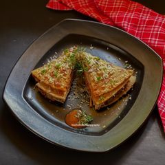 A picture of Mexican Enchilada with Indian twist.