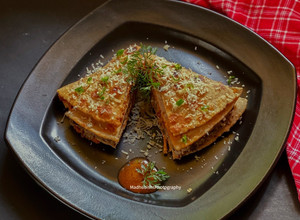 A picture of Mexican Enchilada with Indian twist.