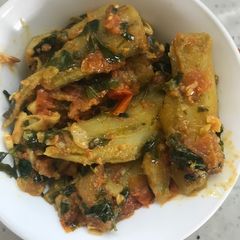 A picture of Karelas sabji with fenugreek leaves.