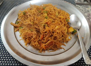 A picture of Vermicelli Upma with Mixed Vegetables.