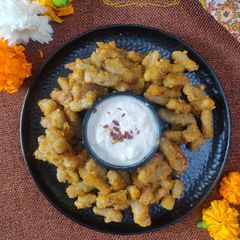 A picture of Pan Sauteed Potato Gnocchi with cucumber yoghurt dip.