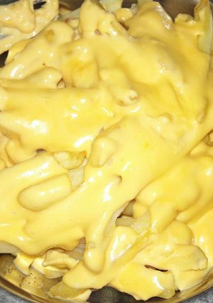 Una foto de Salsa cheddar
