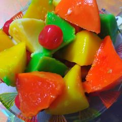 A picture of Colourful fruits custard ice cream.