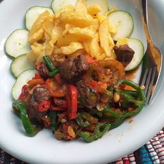 A picture of Fried chips with liver sauce.