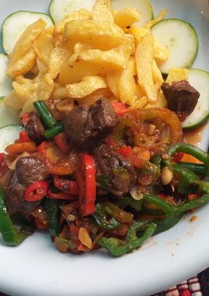 A picture of Fried chips with liver sauce.