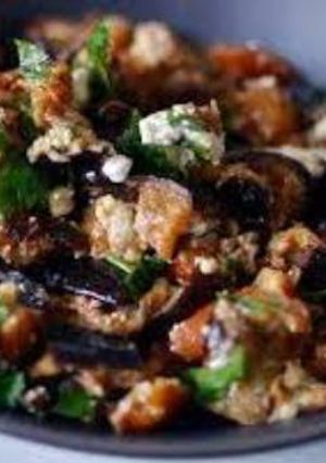 A picture of Grilled eggplant salad with walnuts.