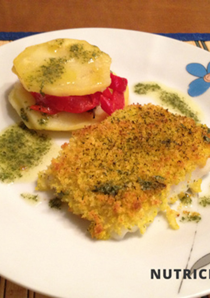 Una foto de Pescado al horno con crujiente de miga