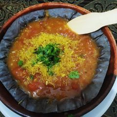 A picture of Famous Banarasi tamatar chat.