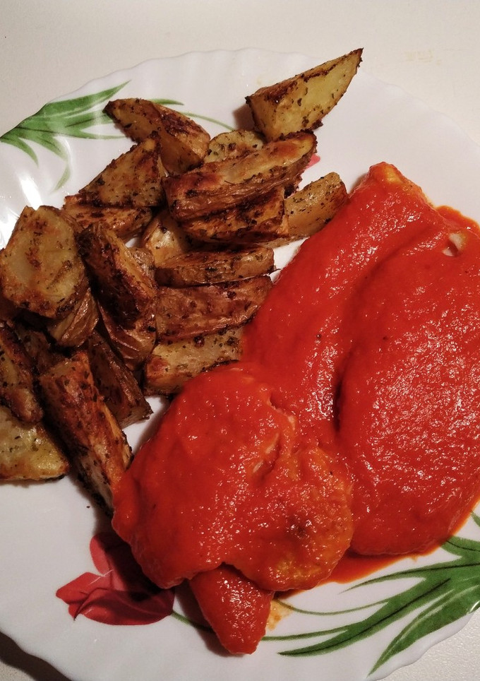 Una foto de Merluza en salsa de pimientos del piquillo