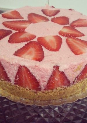 Una foto de Tarta de yogur y fresas