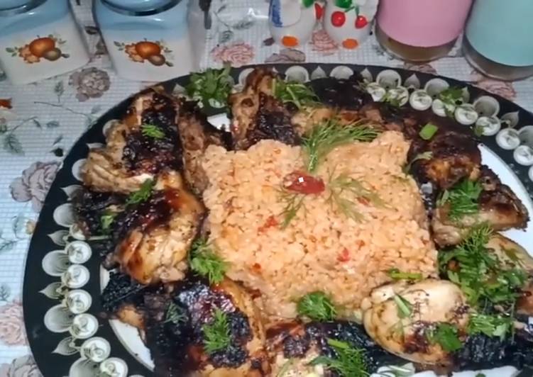 اشهي ارز باطماطم ممكن يتقدم مع الفراخ المشويه