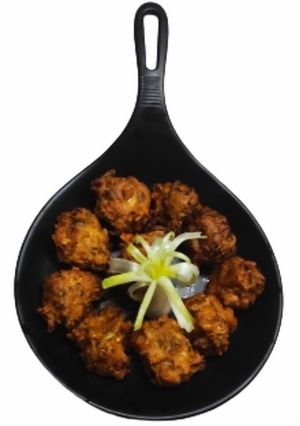 A picture of Spring onion & cauliflower fritters.