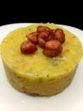 Timbal de puré de patatas repollo y salchichas (col)