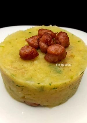 Una foto de Timbal de puré de patatas repollo y salchichas (col)