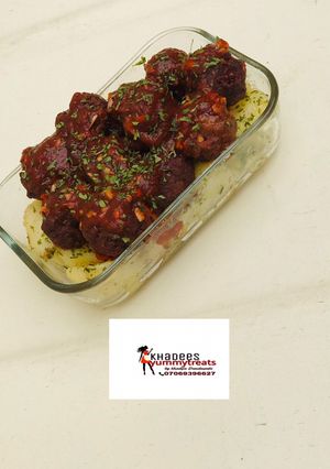 A picture of Parsley Potatoes with meatballs.