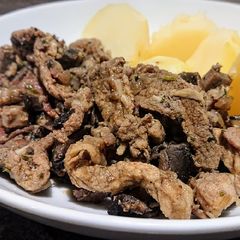 A picture of Pork with Mushrooms and Bacon.