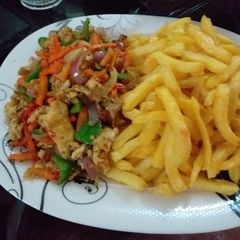 A picture of Fried potatoes with scramble egg.