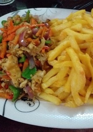 A picture of Fried potatoes with scramble egg.