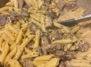A picture of sirloin steak with mushrooms