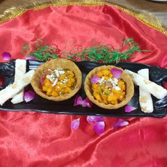 A picture of Baked mango cups full with mango salsa.it is an innovative dish.