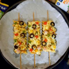 A picture of Penne pasta pizza sticks.