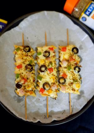 A picture of Penne pasta pizza sticks.