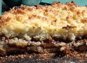 Una foto de Tarta de coco y dulce de leche😋