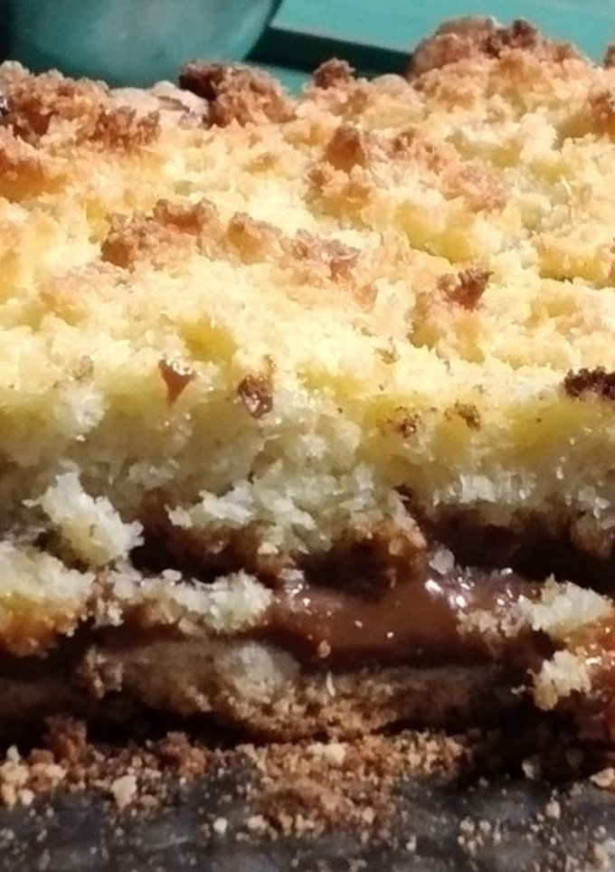 Una foto de Tarta de coco y dulce de leche😋