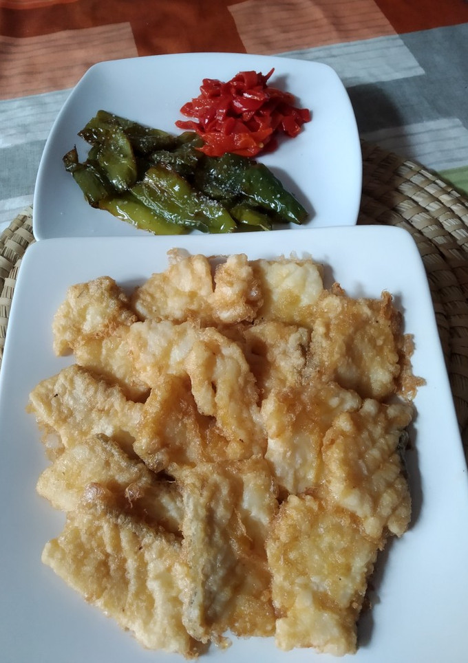 Una foto de Bacalao con pimientos