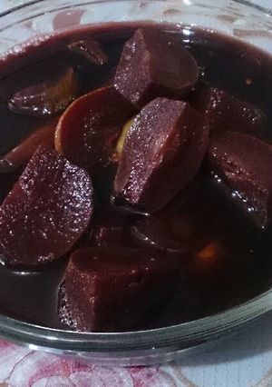 Una foto de Peras en vino tinto