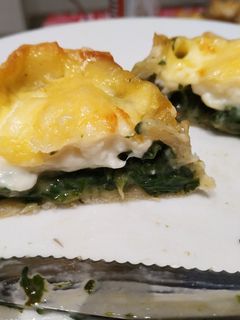 Una foto de Canastitas de acelga y salsa blanca