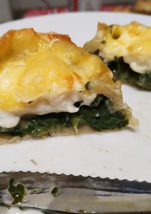 Una foto de Canastitas de acelga y salsa blanca