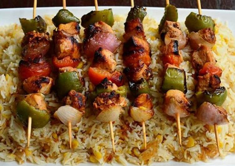 Simple Way to Prepare Award-winning Chicken tikka sticks with chana daal garlic rice
