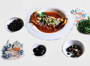 A picture of Mexican Enchilada With black bean, cheese, black olives and etc. Stuffing.