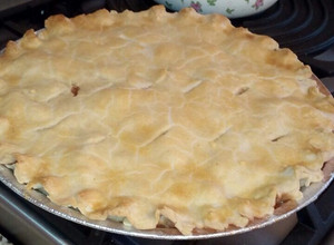 Una foto de Pie de manzana con nueces caramelizadas