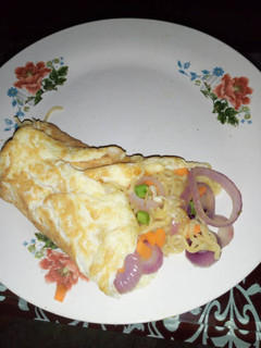 A picture of Noodles wrapped in egg.