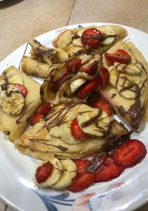Una foto de Crepes de Nutella con Fresas y banana