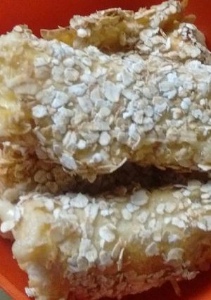 Una foto de Bastones de avena y queso