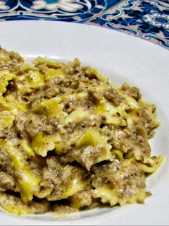 Una foto de Pasta con salsa de setas y queso