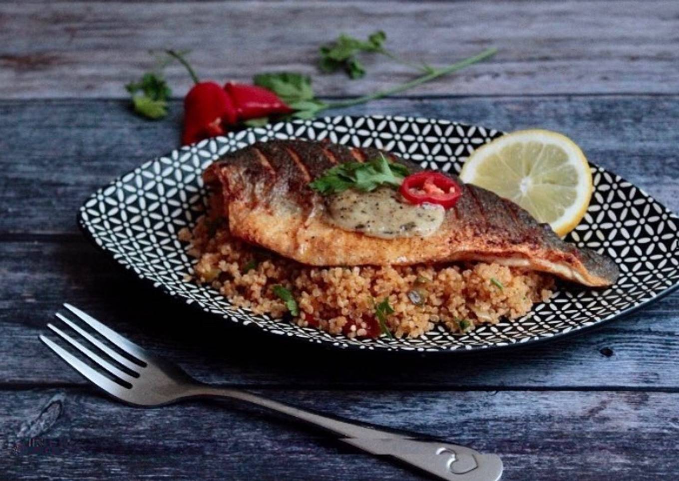 Spiced cous cous with seared seabass