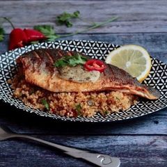 A picture of Spiced cous cous with seared seabass.