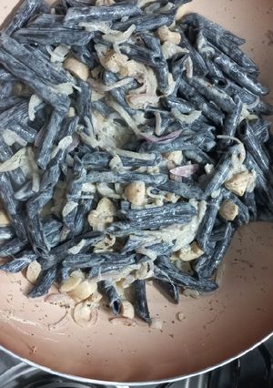 Una foto de Penne negro